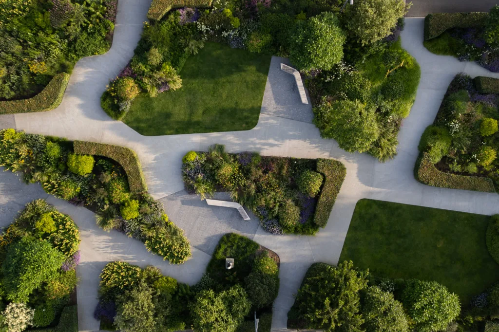 Hepworth gallery gardens from above birdseye drone view looking straight down at sunrise showing concrete paths and areas of planting