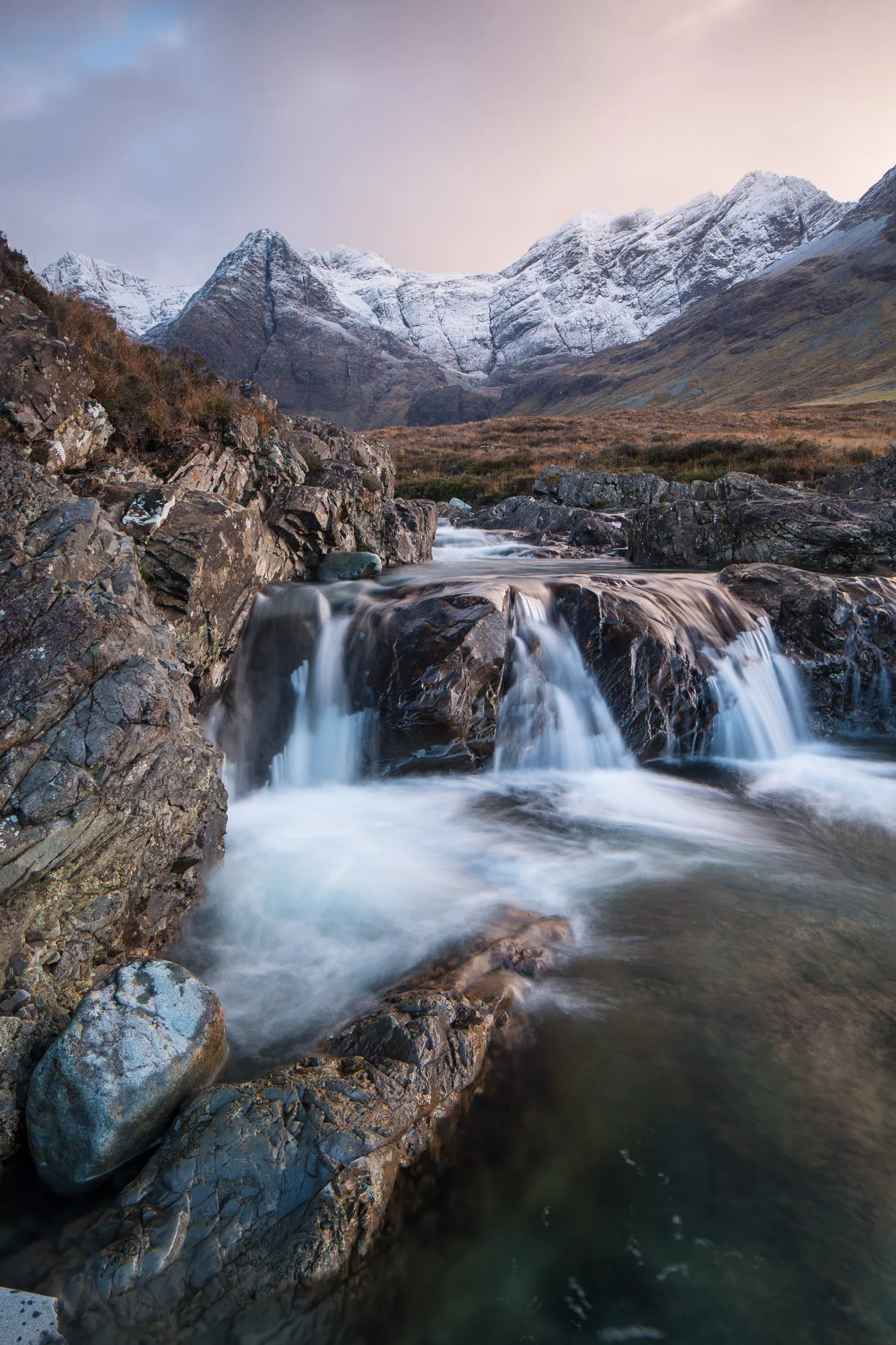 Fairly Pools wild swimming river in winter on the Isle of Skye, Scotland