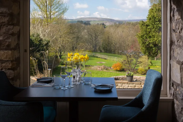 Table setting at fine dining restaurant with view out to gorgeous Yorkshire Dales Countryside