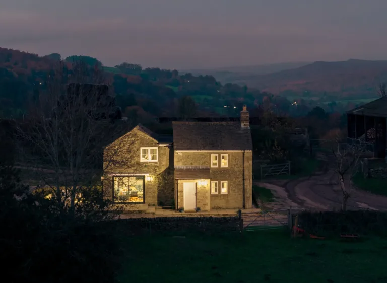 Dusk shot of a remote isolated holiday cottage in the peak district at night or dusk
